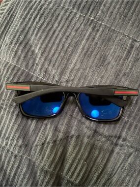 Gucci Black Frame Sunglasses with Blue Lenses and Red-Green Temple Stripe